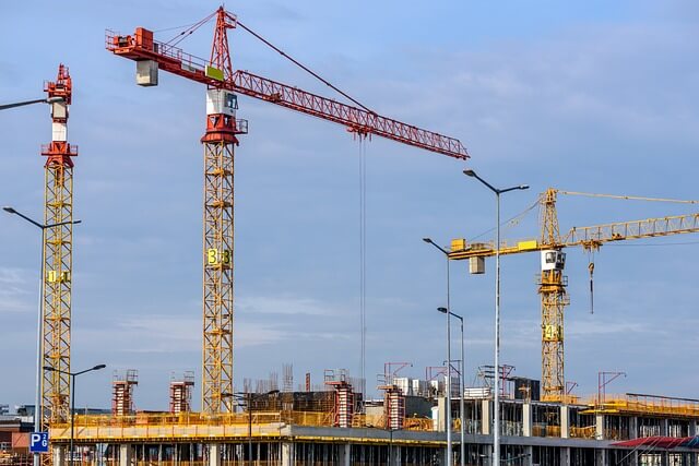 large tower cranes construction site