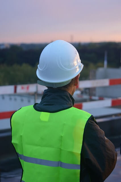building surveyor wearing helmet